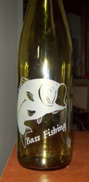 A etched glass wine bottle.