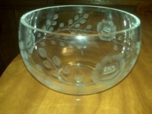 A etched glass bowl with a mixture of sandblasting and engraving.
