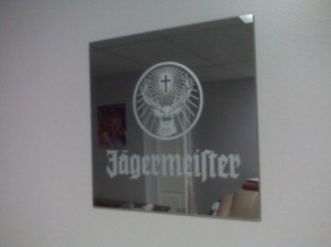 Etching of a Jagermeister mirror glass.