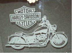 Motorcycle etched from the back side of the glass step 4.