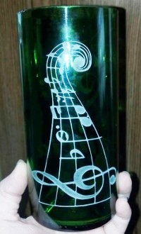 A music clef etched into a bottle