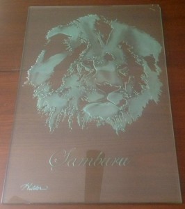 A lion etched 1/4 inch deep by sandcarving.