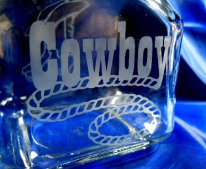cowboy etched on a sealable jar