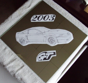 Stencil placed on mirror diagonally.