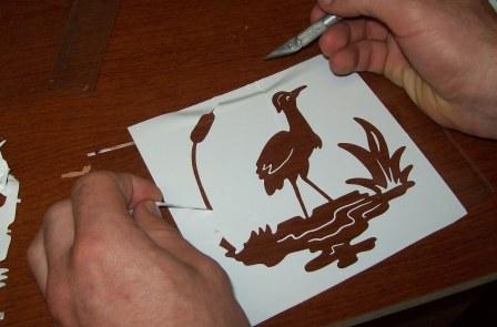Cutting out your stencil.