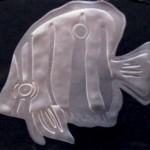 Sandcarved tropical fish etching on glass with two steps.