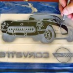 Multi-stage sandcarving a Corvette into plate glass.