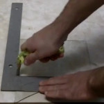 Cutting glass with a cutter wheel.