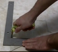Cutting glass with a cutter wheel.