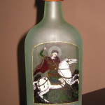 Artistic bottle etched and carved with St. Georgije.