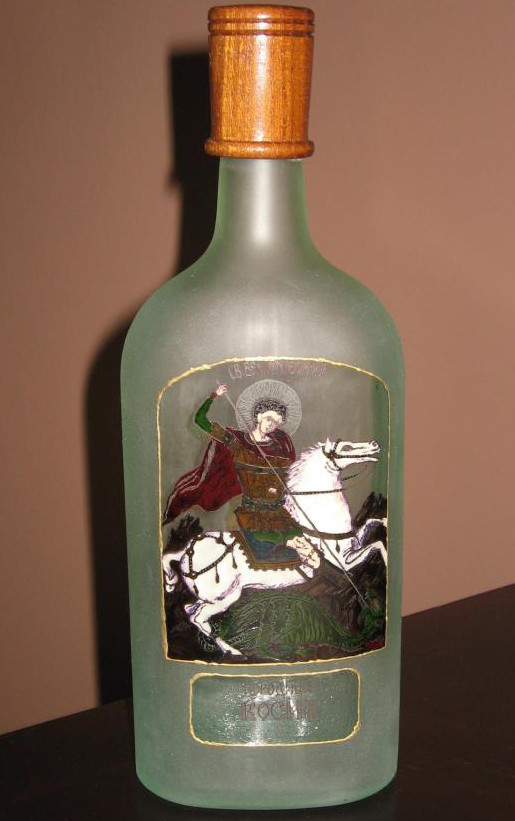 Artistic bottle etched and carved with St. Georgije.