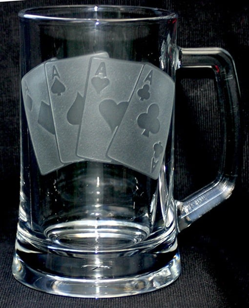 cards etched on beer mug