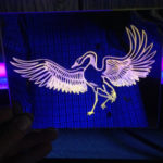 blacklighted etching on glass mirror