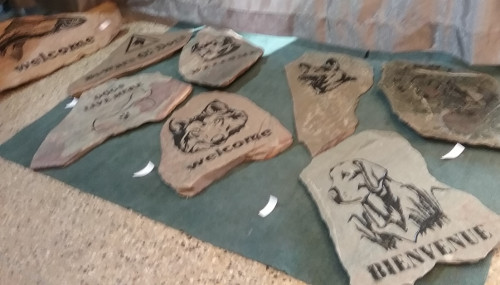 carved rocks displayed at a flea market