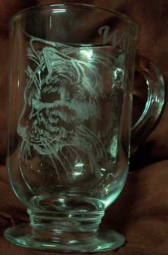 Rotary engraved cat on glass mug.