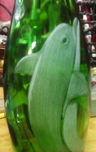 Dolphin engraved bottle