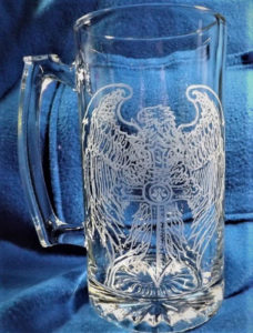 A mug etched with a Dremel rotary tool of an eagle.