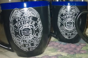 Engraved cermaic cop mugs.