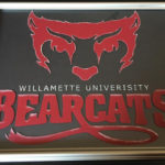 Etched and painted university logo of Willamette University.