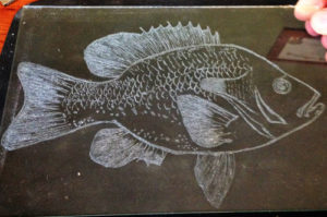 Finished fish hand engraving