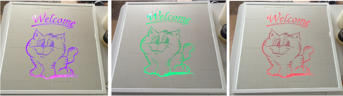 LED mirror etching of welcome sign in multi-colors.