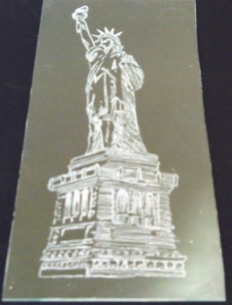 Rotary engraving of the statue of liberty.