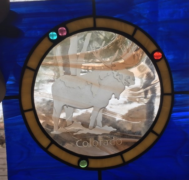 Moose sandcarve etched stained glass.