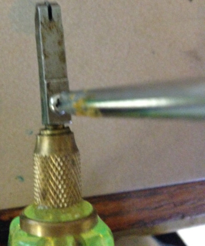 remove cutter head with screwdriver to remove