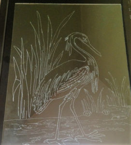 rotary engraved heron