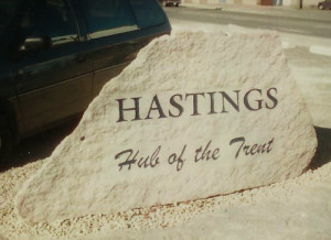 Town names stone sign blasted
