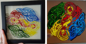 Glass painting on picture frame by Jade Elizabeth.